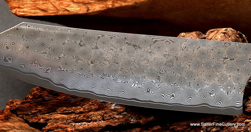 This knife has a pattern that was completely made by hand the old-fashioned way. Every small whirlpool created by hand in Japan and offered to you by Salter Fine Cutlery to you 
