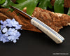 Collectible hunters knife with blue liners  and faux snake pattern stone handle from Salter Fine Cutlery
