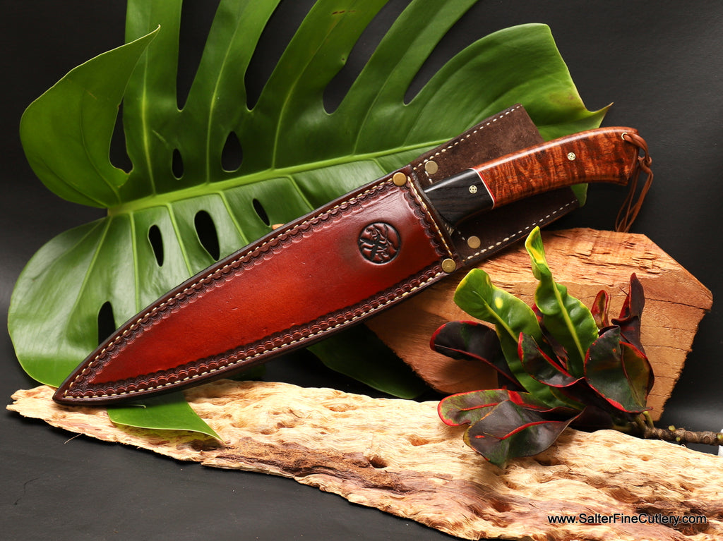 155mm hunting knife shown partially out of custom handmade leather belt sheath offered by Salter Fine Cutlery