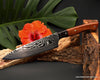 210mm chef knife from our new Camelback design series R2 stainless steel handforged blade with desert shifting sands damascus pattern and curly koa wood handle with long ebony bolster from Salter Fine Cutlery 