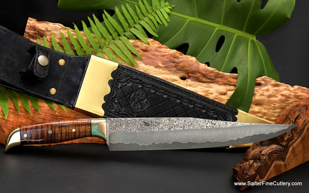 240mm Carving knife with bowie style handle and brass fittings including special decorative belt sheath with brass accents from Salter Fine Cutlery