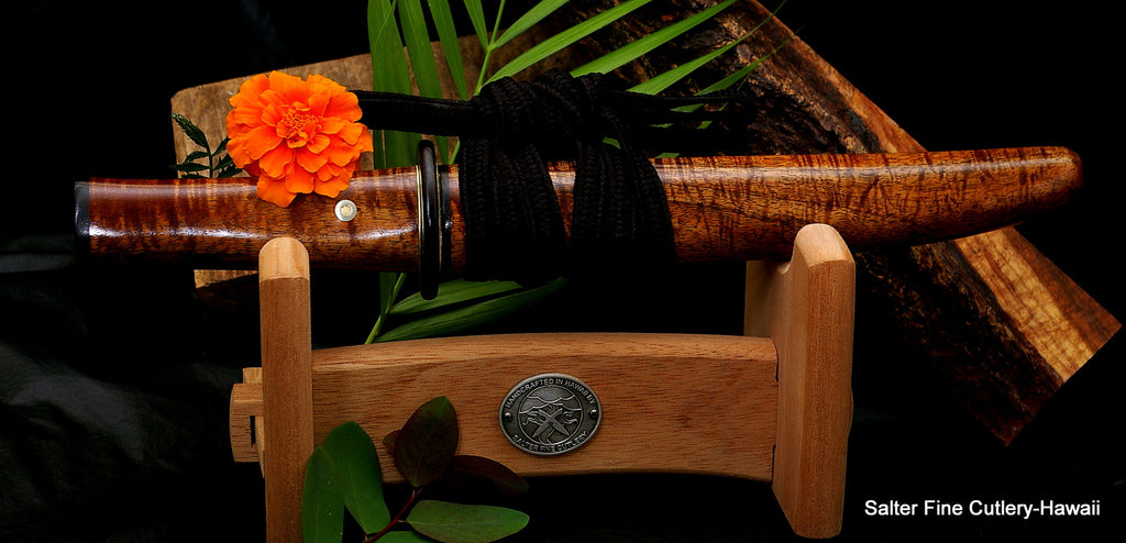 Handcrafted collectible knife in saya with Hawaiian rare koa wood and Mozambique ebony accents on stand